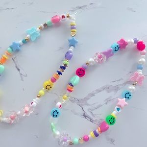 Preppy beaded phone charm. (Does not come with case).